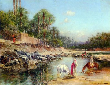Figuras de pie junto a una caravana Victor Huguet orientalista Pinturas al óleo
